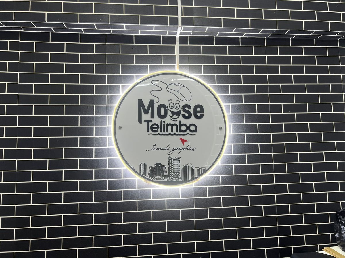 Mouse Telimba illuminated circular studio sign Nasser Business Centre G224 Kampala Uganda